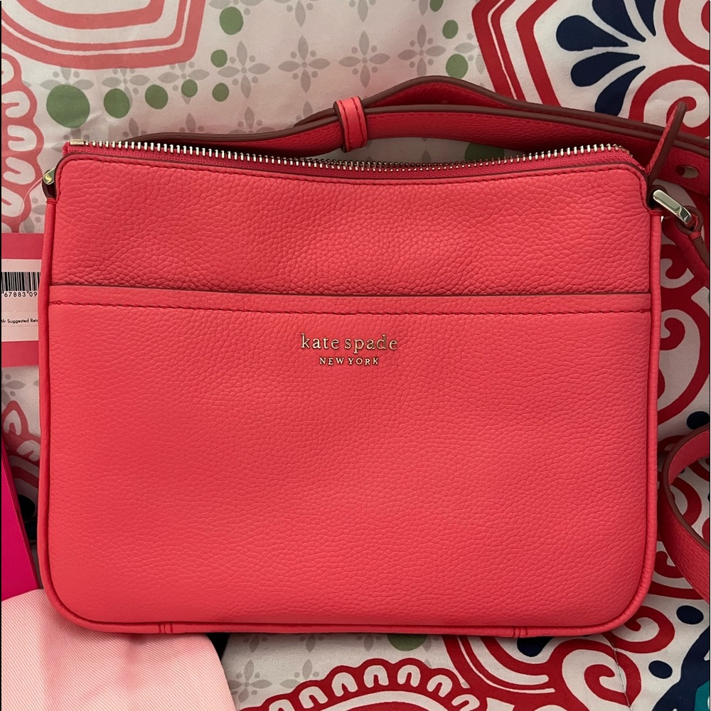 kate spade Run Around medium crossbody. Still  sold on the Kate Spade website.